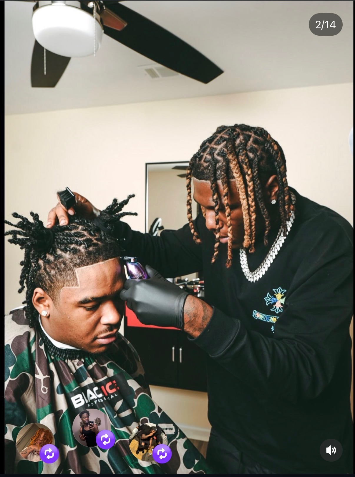 Barber with braids precision-cutting a client's hair